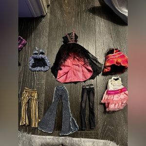 Lot of random doll clothes